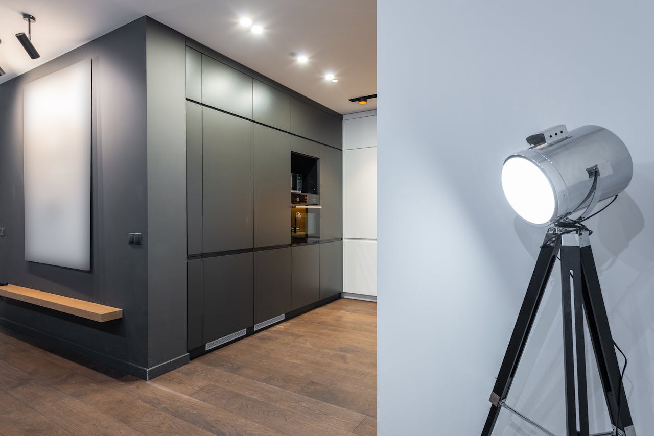 Sleek modern kitchen interior with minimalist design and studio lighting, showcasing contemporary style.